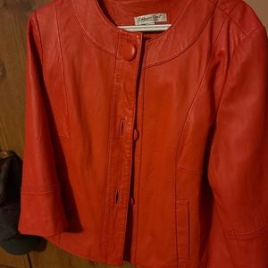 COLDWATER CREEK WOMENS ORANGE LEATHER JACKET SIZE  16. SWING BACK.